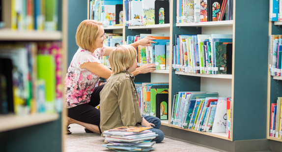 library, book, indoor, casual, young, bookshelf, interior, building, public, school, room, adult, education, people, person, happy, librarian, occupation, work, mature, female, 40s, girl, learning, sitting, woman, women, leisure, read, choosing, collection, shelf, children, child, bookcase, boy, elementary, lifestyle, primary, together, sit, mother, mom, teach, pick, son, family, reading, teacher, zzzapnaabbdcdadbddcndadicndadbcndadjdddjdfdh
