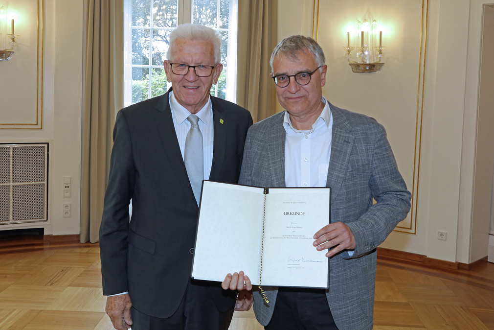 Ministerpräsident Winfried Kretschmann und Staatssekretär Arne Braun